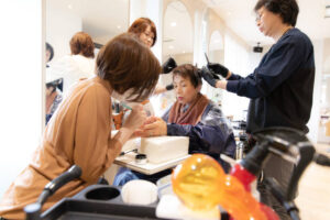 Japanese senior woman having beauty treatment